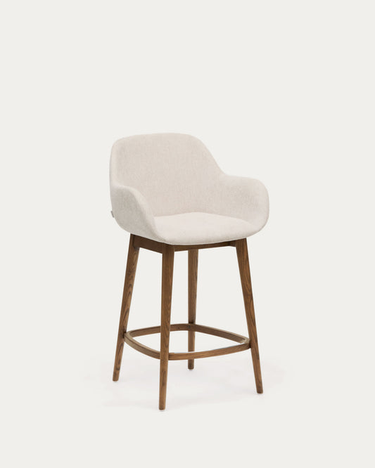 Sgabello Konna beige e gambe in legno massello di frassino finitura scura 65 cm