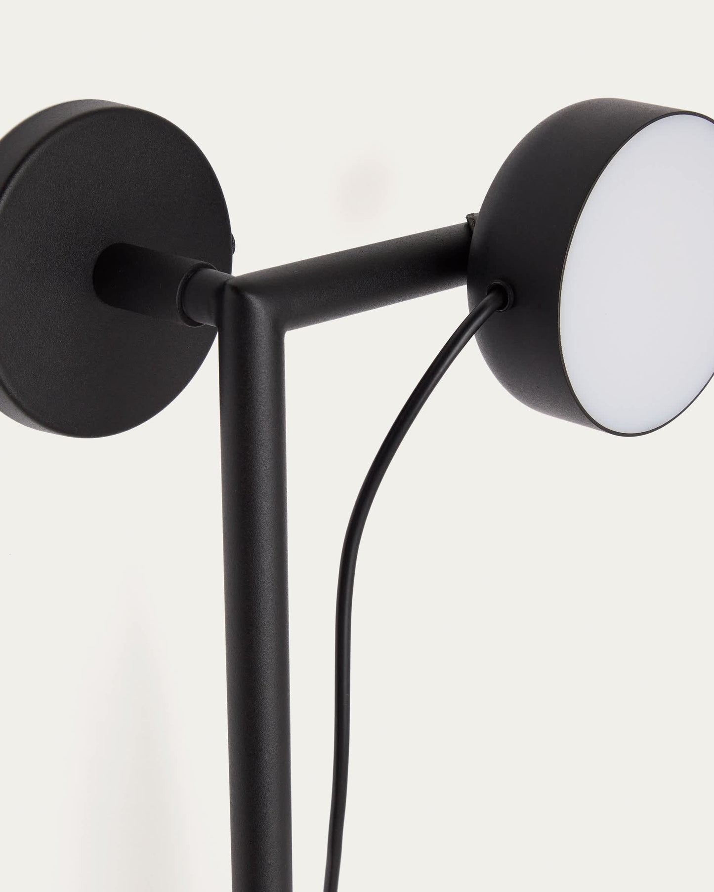 Applique Orey in metallo nero con faretto multiposizione