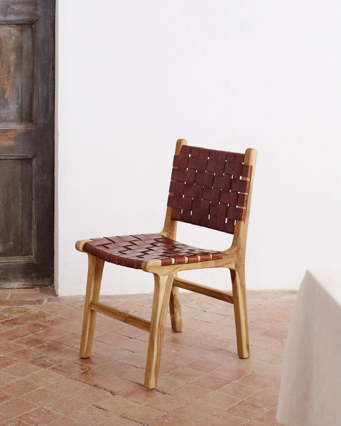 Sedia Calixta in pelle e legno massello di teak