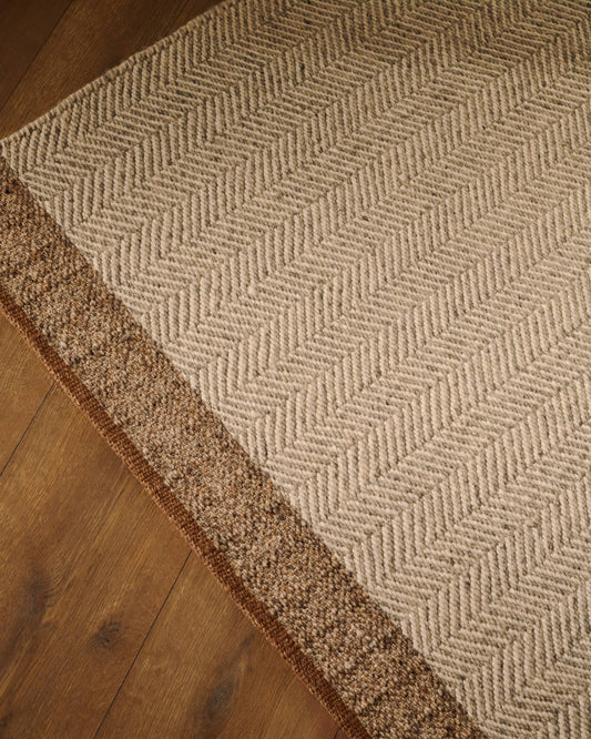 Tappeto Nifelia jacquard in lana beige 160 x 230 cm