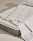 Piumino Atra in piumino e piuma da 190 gr/m² per letto da 80/90 cm prodotto in Spagna