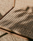 Poltrona Itani in legno massiccio di acacia e rattan sintetico