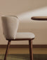 Sedia Ciselia in ciniglia beige e gambe in legno massiccio di frassino con finitura noce
