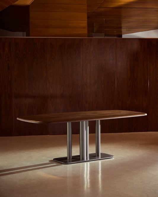 Tavolo Melvar in impiallacciato di noce e gambe con base in acciaio inox spazzolato 220 x 110 cm