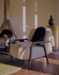 Poltrona Sylo in ciniglia beige e legno massiccio di frassino con finitura color noce