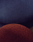 Pouf sfoderabile Kaeli in tessuto bouclé terracotta Ø 43 cm