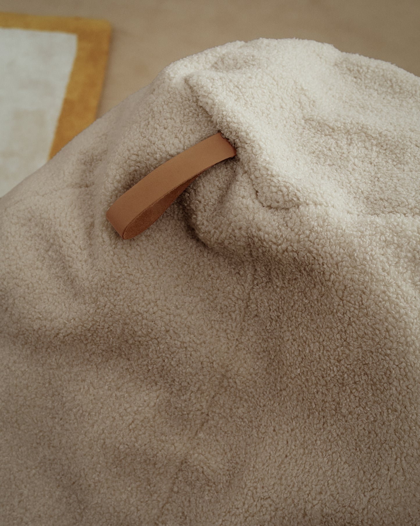 Pouf Vicka tessuto bouclé beige Ø 70 cm