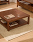 Tavolino da appoggio Norani in legno massiccio e impiallacciatura di acacia 90 x 90 cm