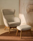 Poltrona Adiran in ciniglia spessa beige con gambe in legno massiccio di rovere con finitura noce