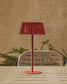 Lampada da tavolo solare per esterni Aldet in corda piatta con base in metallo color terracotta
