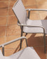 Sedia impilabile da esterno Canea in texteline beige e alluminio color tortora