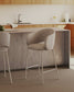 Sgabello Maina di ciniglia beige e gambe in acciaio con finitura beige 65 cm