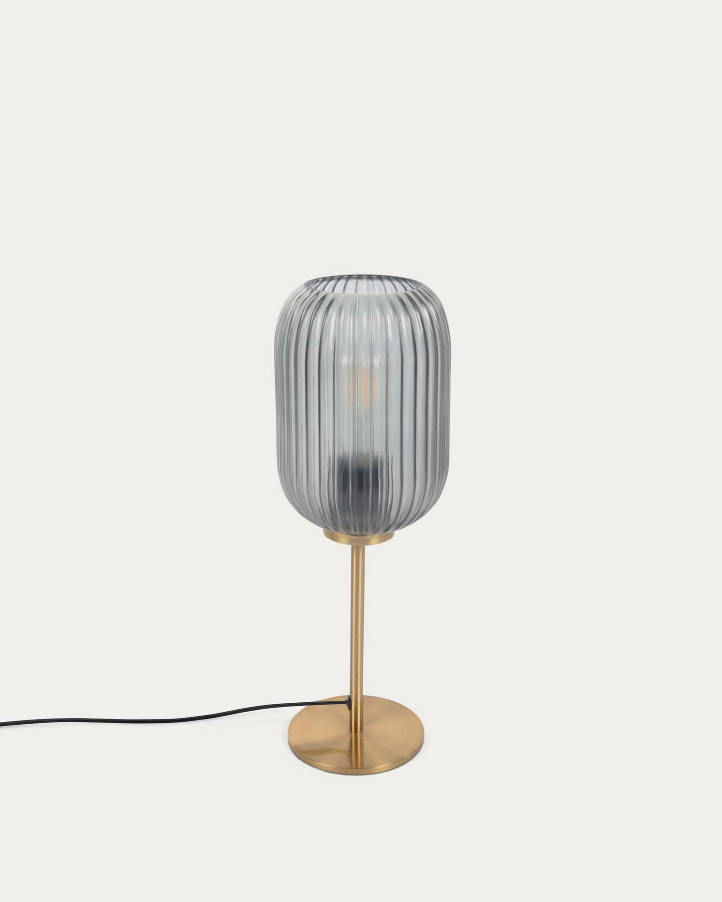 Lampada da tavolo Hestia in metallo con finitura in ottone e cristallo grigio