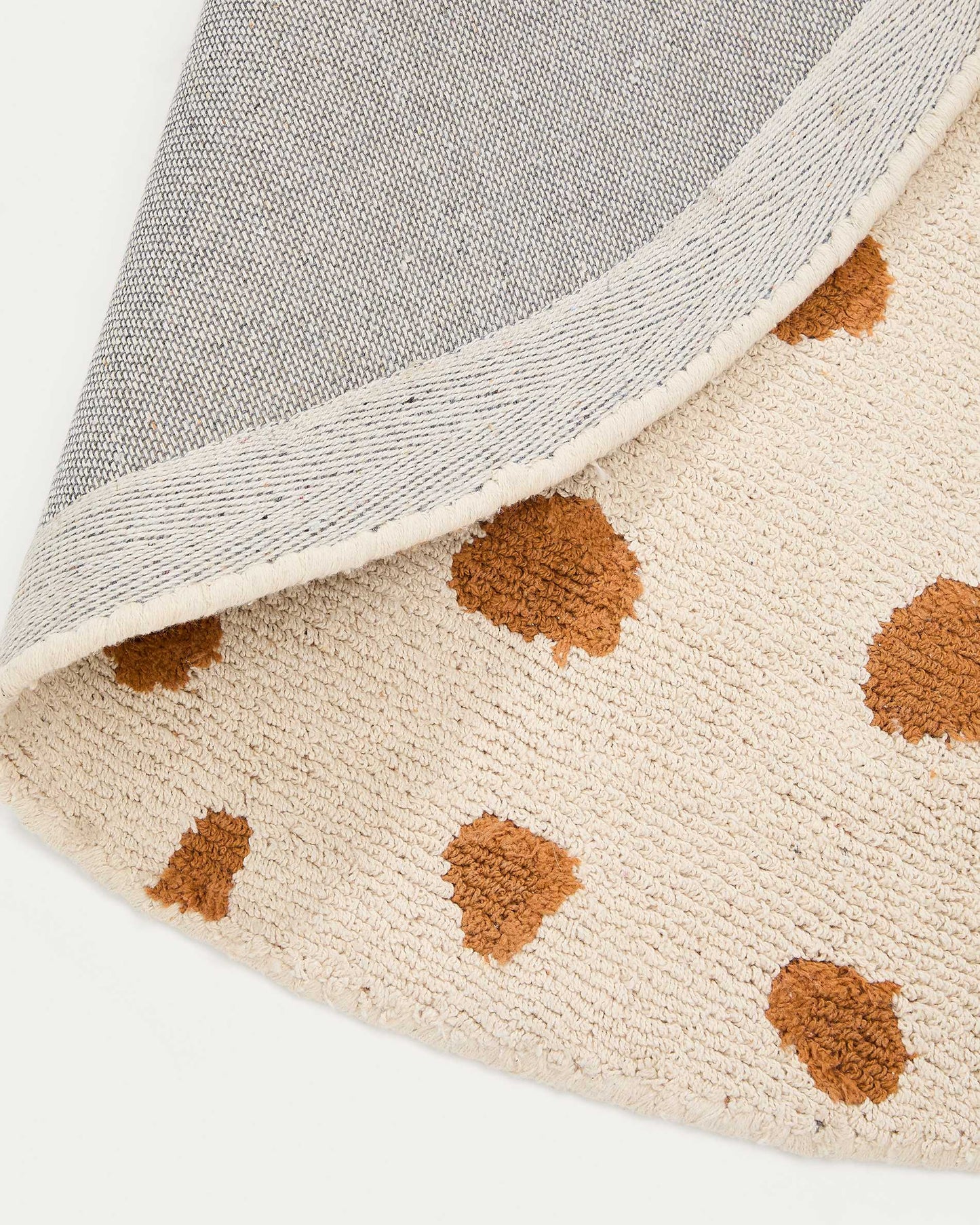 Tappeto rotondo Tandani in cotone beige con disegno di ghepardo arancione Ø 100 cm