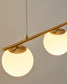 Lampada da soffitto Brisia in metallo con finitura in ottone spazzolato e 3 sfere di vetro satinato Ø 15 cm