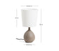 Lampada da tavolo piccola Viona con effetto pietra testurizzata e paralume in cotone