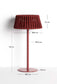 Lampada da tavolo solare per esterni Aldet in corda piatta con base in metallo color terracotta