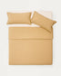 Set Sifinia copripiumino e federa 100% cotone percalle con frange mostarda letto 90 cm