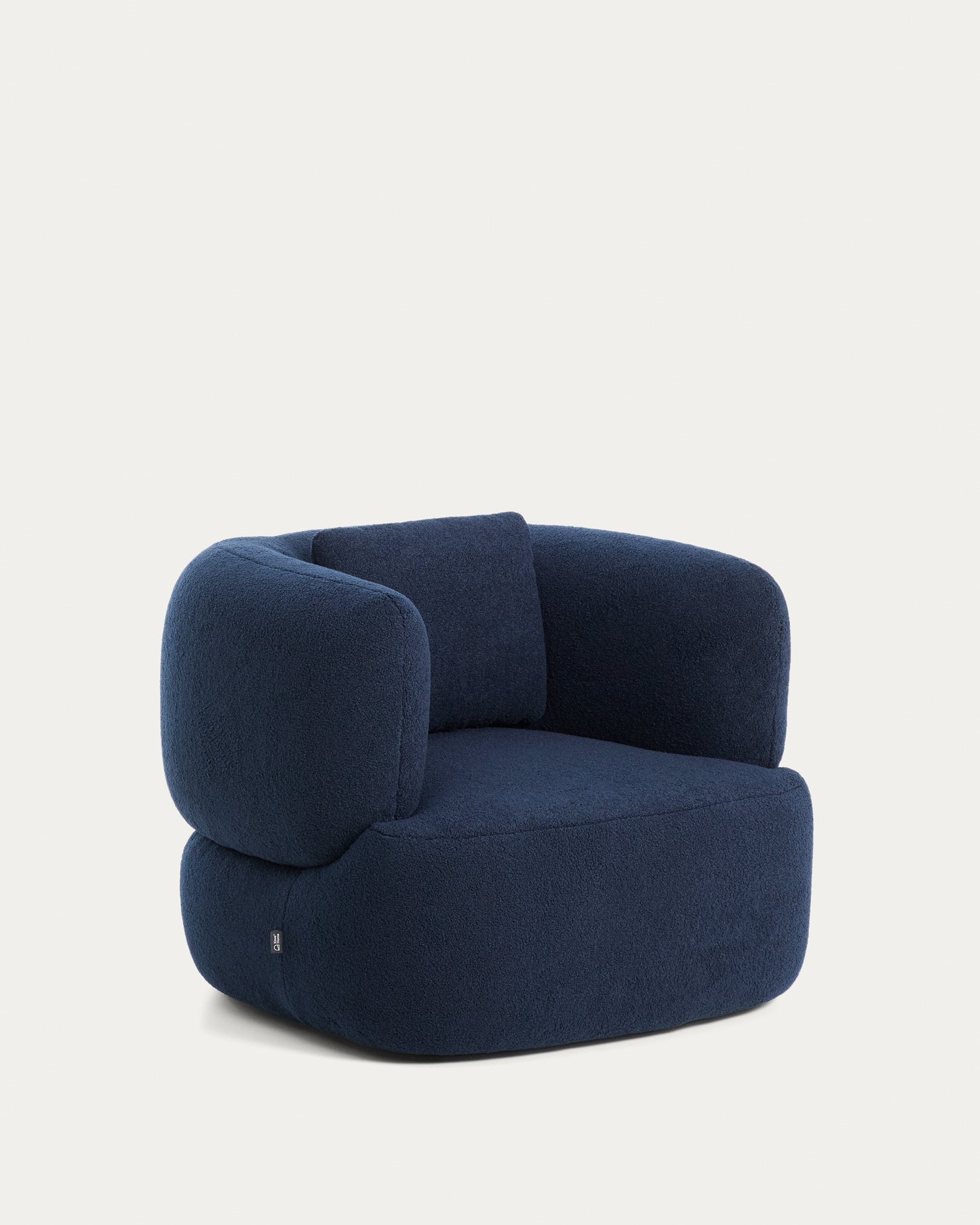Poltrona girevole Martina con cuscino in bouclé blu navy