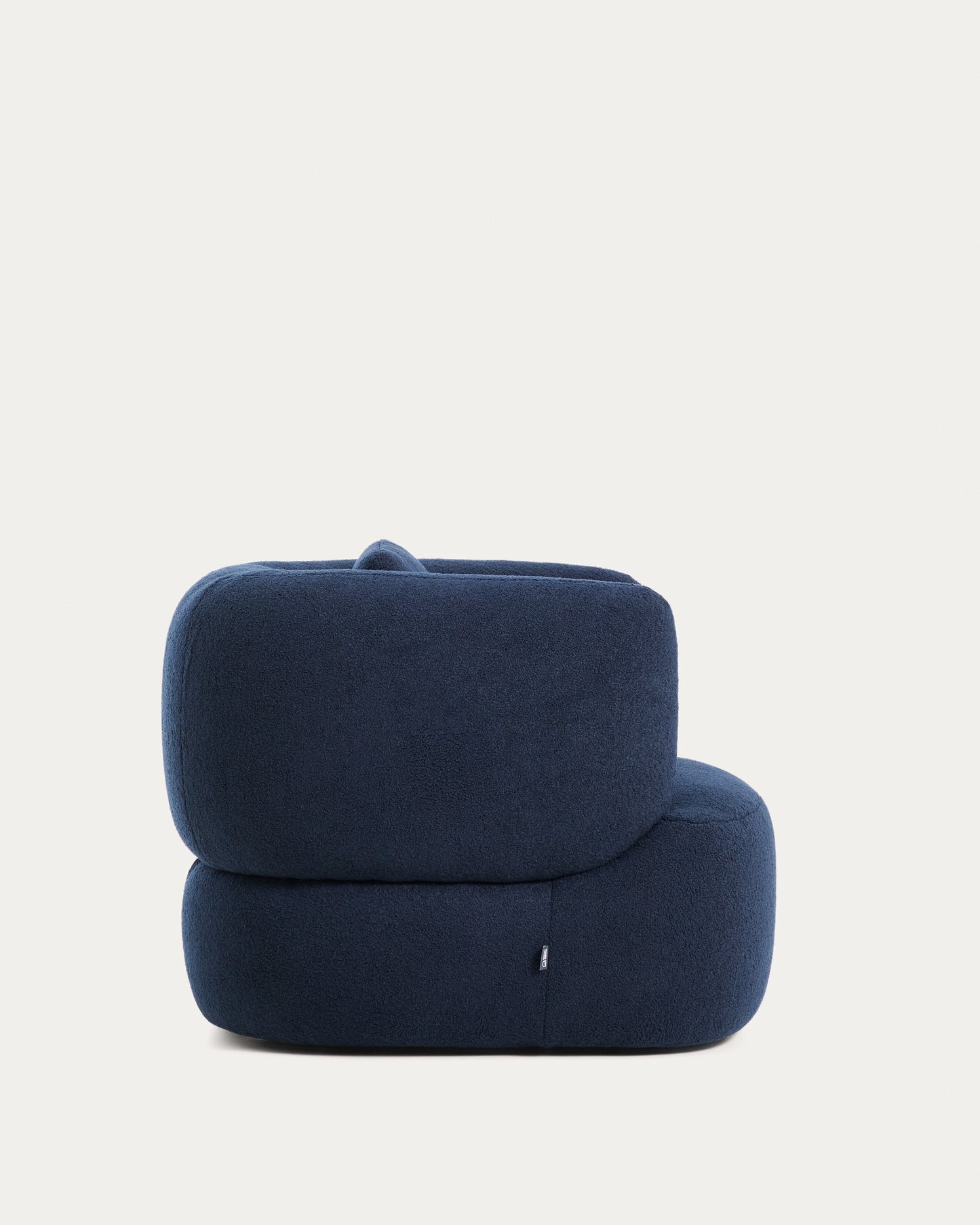 Poltrona girevole Martina con cuscino in bouclé blu navy