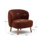 Poltrona Ulit in shearling terracotta e piedi in legno massello di faggio finitura naturale