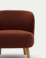 Poltrona Ulit in shearling terracotta e piedi in legno massello di faggio finitura naturale