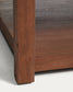 Tavolino da salotto Norani in legno massiccio e impiallacciatura di acacia 150 x 70 cm