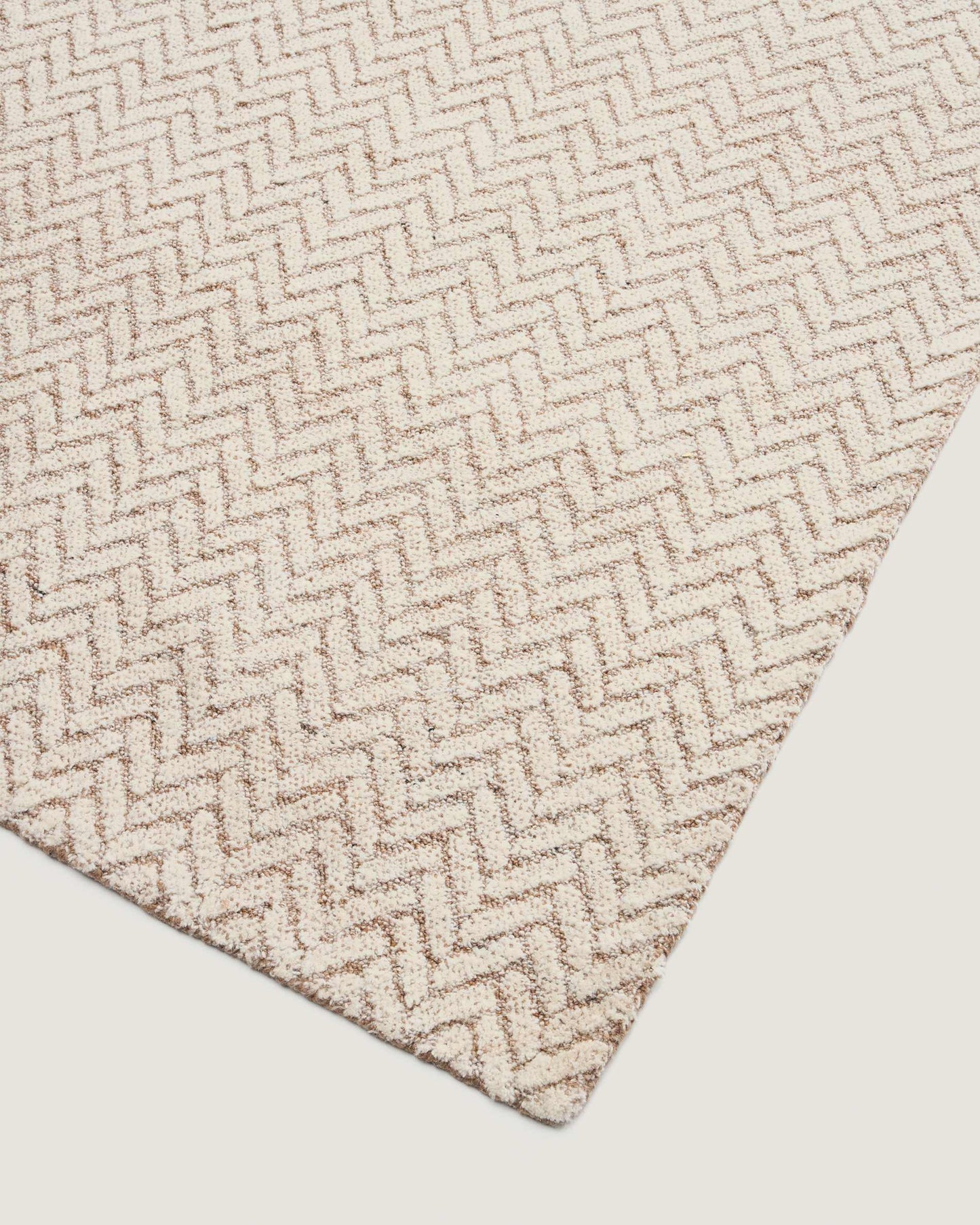 Tappeto Calira in lana jacquard intrecciata beige 230 x 160 cm