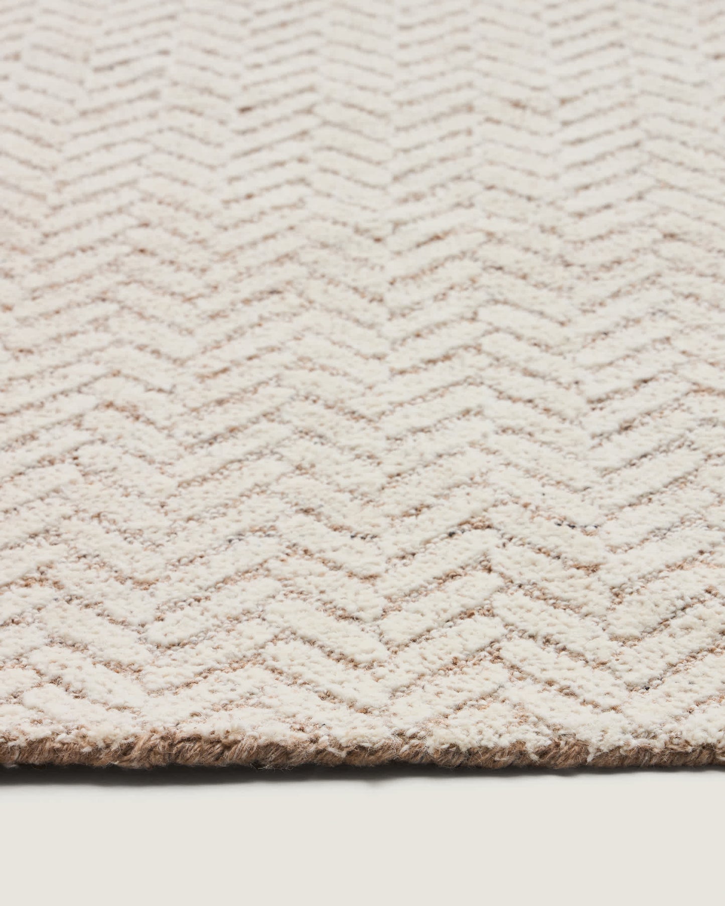 Tappeto Calira in lana jacquard intrecciata beige 230 x 160 cm