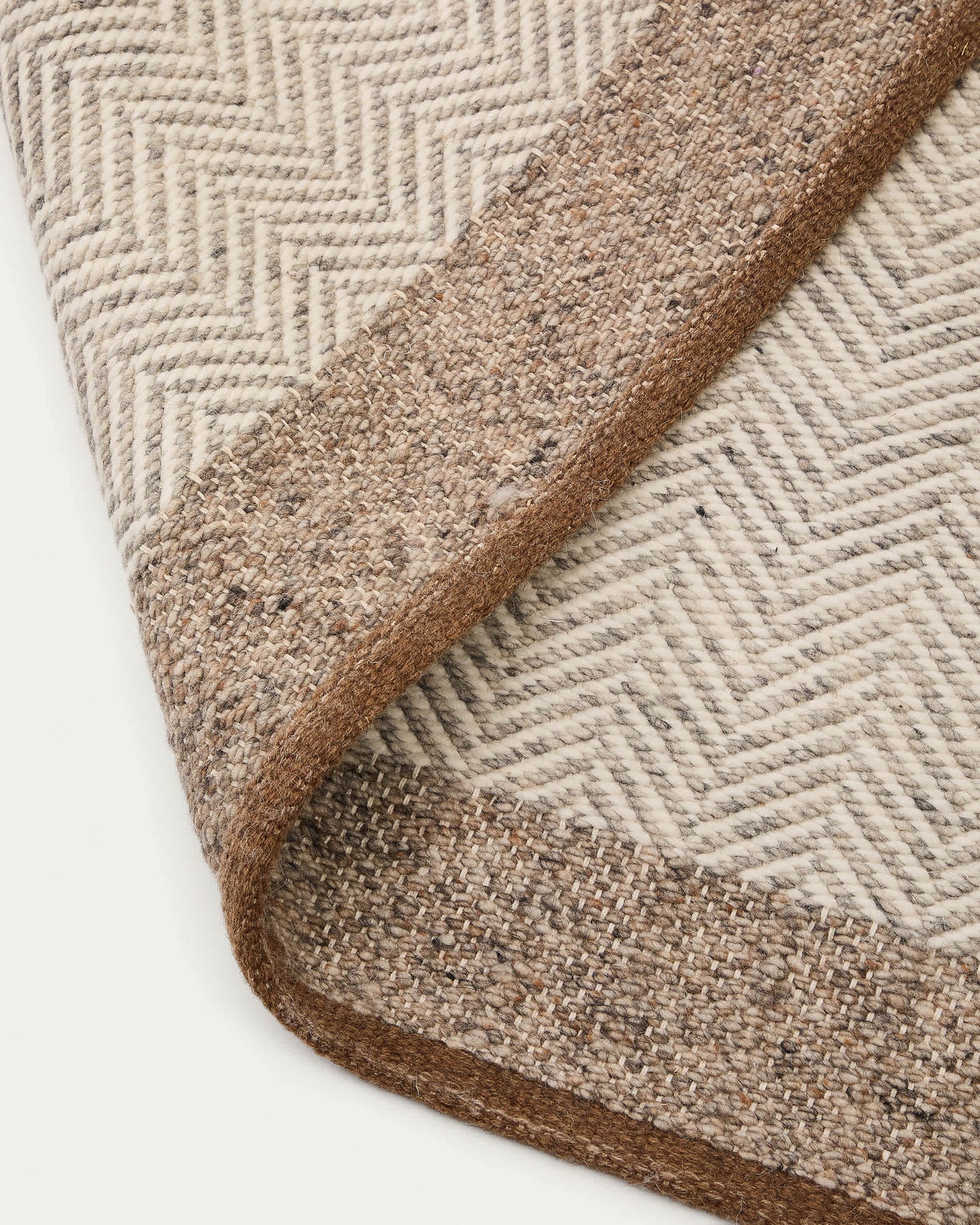 Tappeto Nifelia jacquard in lana beige 200 x 300 cm