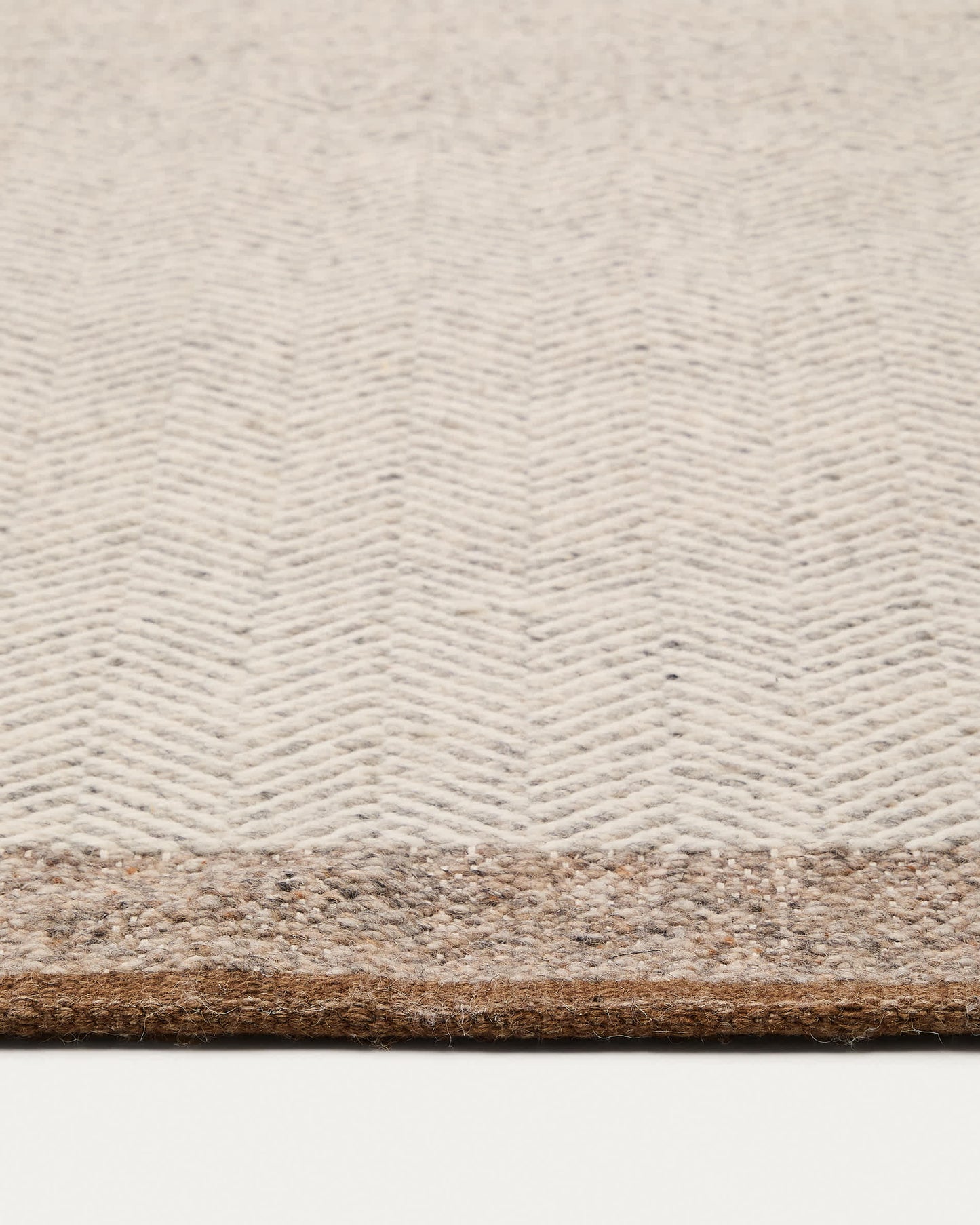 Tappeto Nifelia jacquard in lana beige 160 x 230 cm