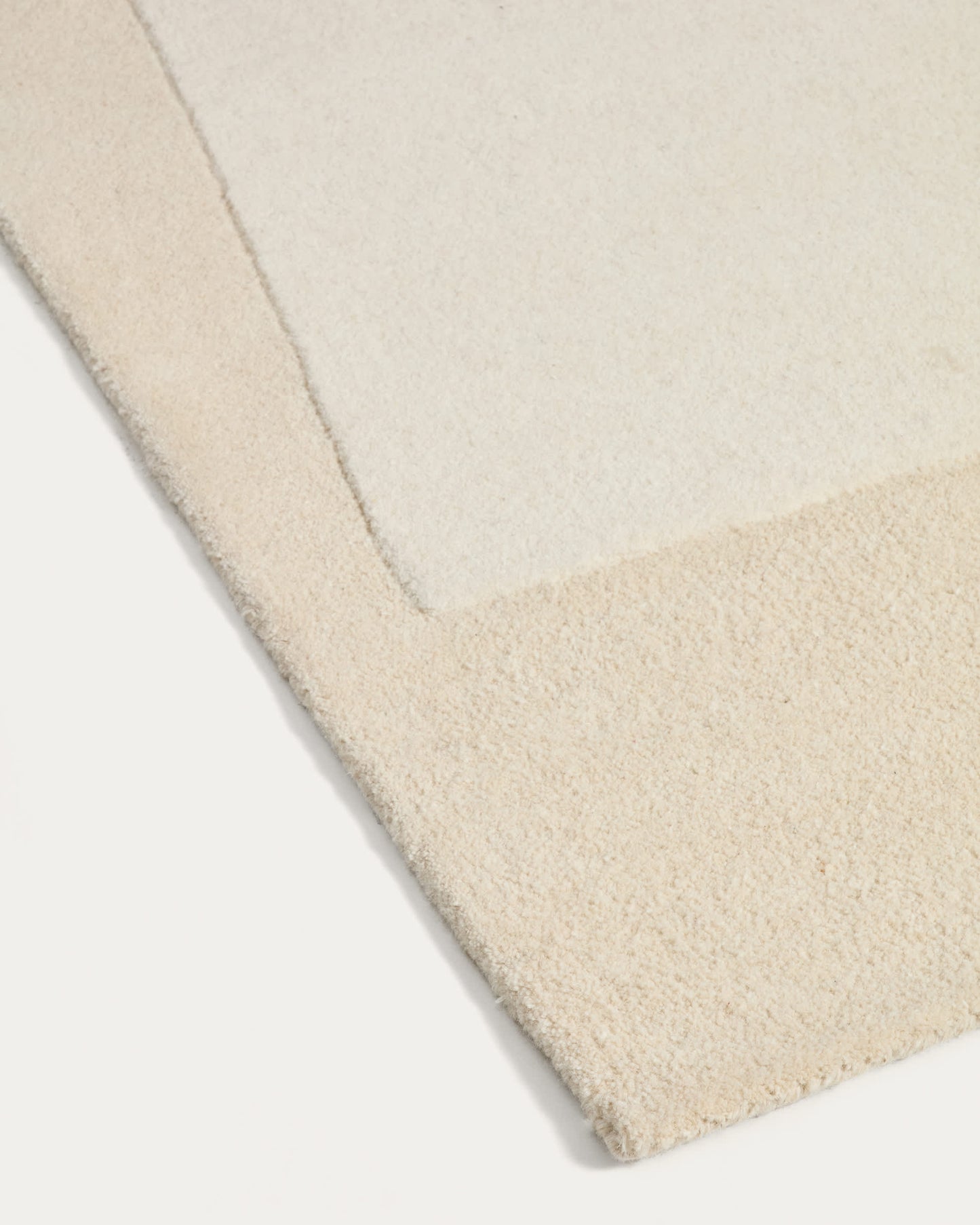 Tappeto Dennie in lana con motivo beige 200 x 300 cm